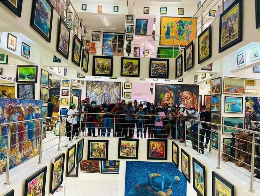 Visitors viewing colourful Nigerian artworks inside Nike Art Gallery in Lekki, Lagos.