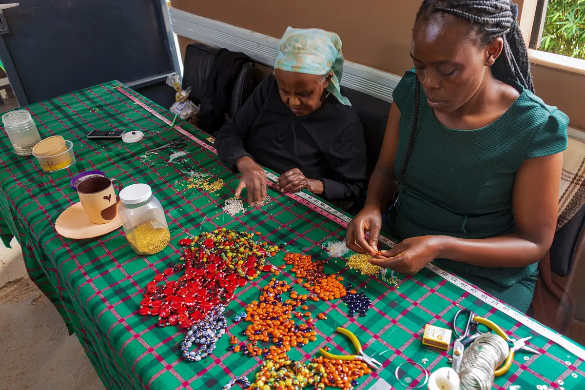 Women making colourful ceramic jewellery at the Kazuri Beads Factory in Nairobi.